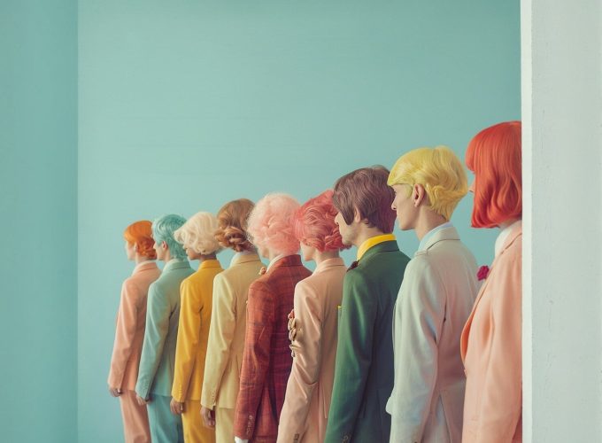 Stylized Figures in Colorful Suits